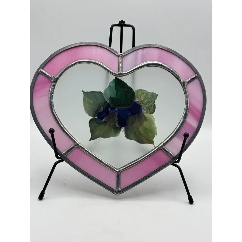 Stained glass heart. With a hand painted floral design.